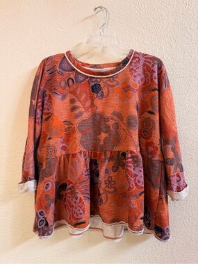 Anthro orange floral sweatshirt peplum blouse